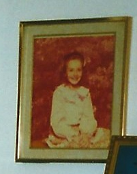 The photo behind my mom on the wall is a wee little me at the Sears Portrait Studio